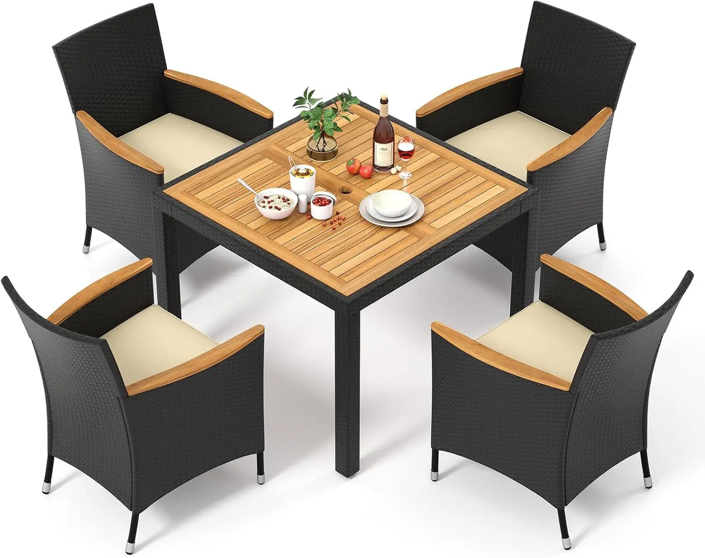 Modern rattan garden furniture set placed in a lush green backyard with soft lighting.