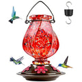 Hummingbird feeder with vibrant red glass design