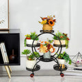 Corner plant stand with small and large potted plants