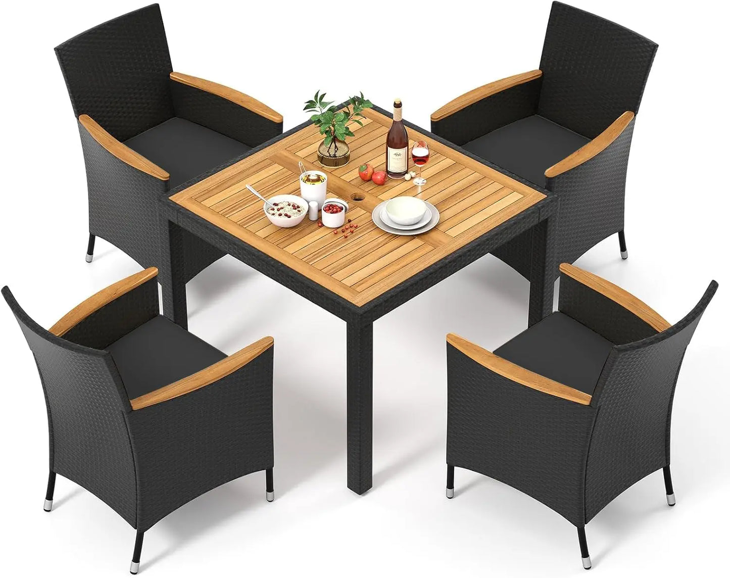 Modern rattan garden furniture set placed in a lush green backyard with soft lighting.