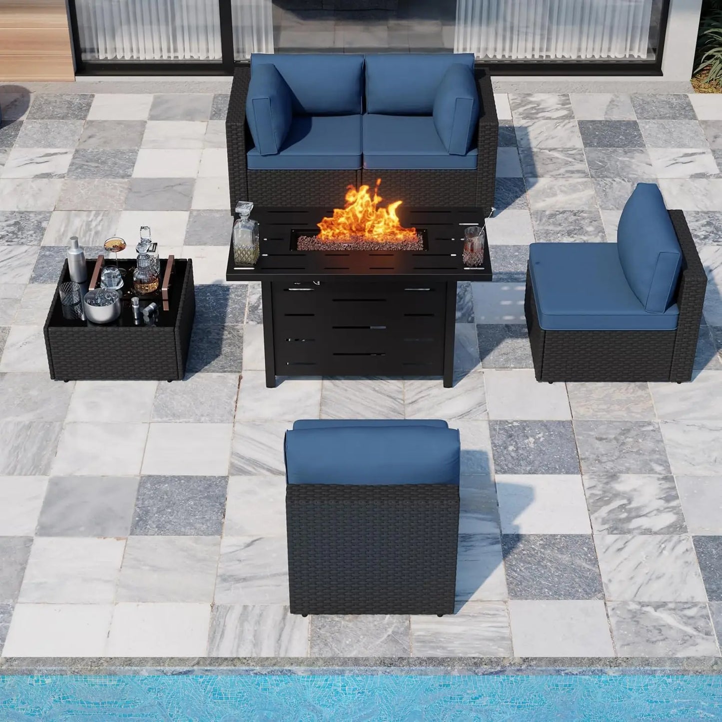 Modern garden patio furniture set featuring outdoor sofa, chairs, and table in a backyard setting.