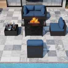 Modern garden patio furniture set featuring outdoor sofa, chairs, and table in a backyard setting.