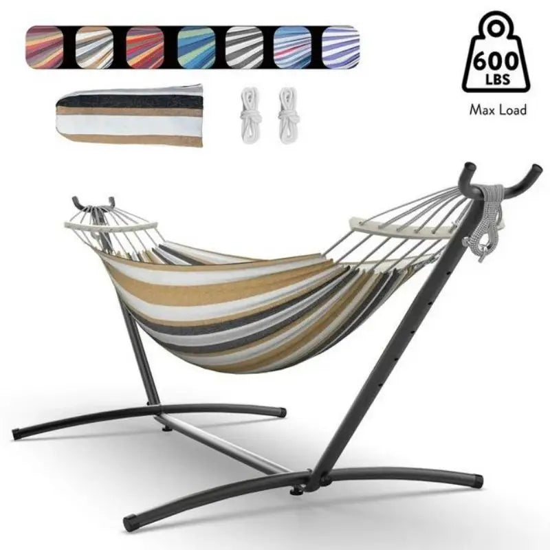 Relaxing hammock on beach with sunset background light color