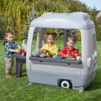 Colorful backyard playhouse for kids