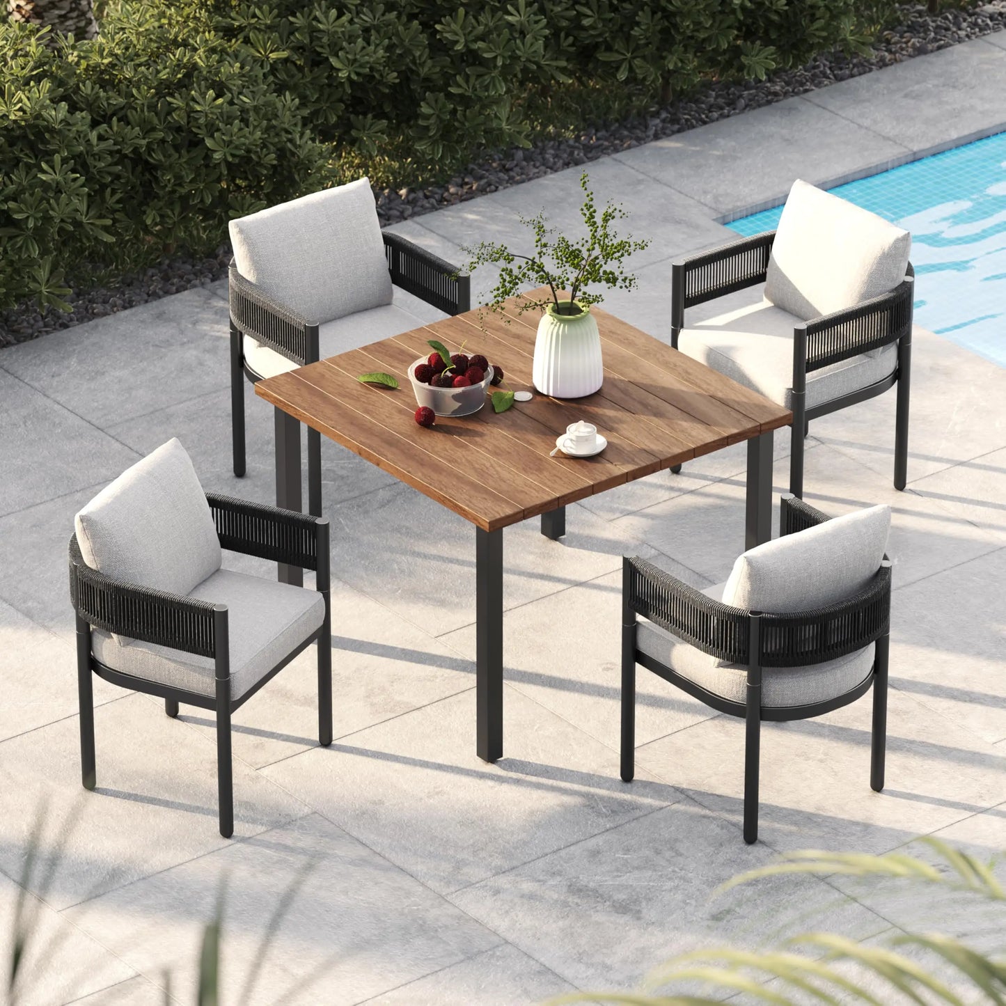 Wooden dining table with four chairs in cozy dining area