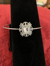 Handmade jeweled silver bracelet. Fits any wrist size because it is adjustable to you.