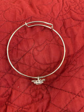 Handmade jeweled silver bracelet. Fits any wrist size because it is adjustable to you.