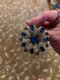 Blue gold and shining rhinestone bangle bracelet. Adjustable to fit any wrist size