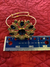 Blue gold and shining rhinestone bangle bracelet. Adjustable to fit any wrist size