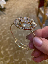 Elegant Rhinestone and gold bangle bracelet. Adjustable to fit any wrist size