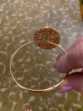 Elegant Rhinestone and gold bangle bracelet. Adjustable to fit any wrist size