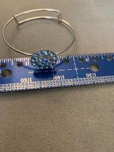 Pale blue rhinestone floral bangle bracelet. Adjustable to fit any wrist size