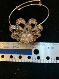 Rhinestone and pearl Victorian style floral bangle bracelet. Adjustable to fit any wrist size