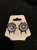 Silver and black floral stud earrings