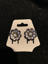 Silver and black floral stud earrings