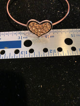Copper and black heart bangle bracelet. Adjustable to fit any wrist size