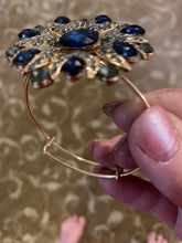 Blue gold and shining rhinestone bangle bracelet. Adjustable to fit any wrist size
