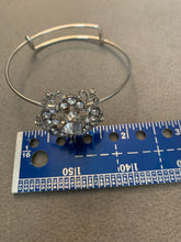 Elegant rhinestone bangle bracelet. Adjustable to fit any wrist size