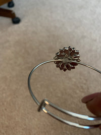 Red an clear rhinestone bangle bracelet. Adjustable to fit any wrist size