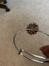 Red an clear rhinestone bangle bracelet. Adjustable to fit any wrist size