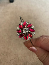Red an clear rhinestone bangle bracelet. Adjustable to fit any wrist size