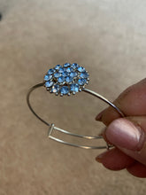Pale blue rhinestone floral bangle bracelet. Adjustable to fit any wrist size