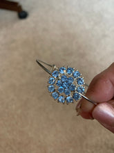 Pale blue rhinestone floral bangle bracelet. Adjustable to fit any wrist size