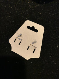 Silver and black floral stud earrings
