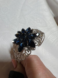 Silver Filigree Bracelet: Blue Rhinestone Starburst Jewel, Adjustable Bangle