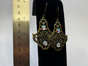 Chandelier shaped antique bronze filigree ear rings with swarskey crystal embellishments