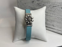 Cork and denim bracelets with silver flower hook