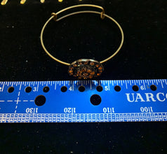 Antique bronze floral bracelet. Adjustable to fit any wrist size