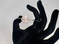 Silver crown with pink rhinestone embellishment on a silver wire bracelet. Princess. Adjustable. Favored one