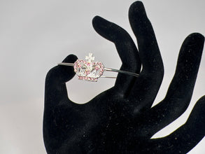 Silver crown with pink rhinestone embellishment on a silver wire bracelet. Princess. Adjustable. Favored one