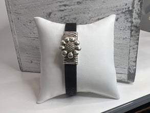 Cork and denim bracelets with silver flower hook