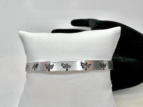 Dragonfly stamped metal bracelet