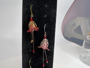 Hand painted lucite flower earring sets in varied colors