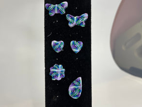 Stained glass looking or kaleidoscope style stud earrings made of clay