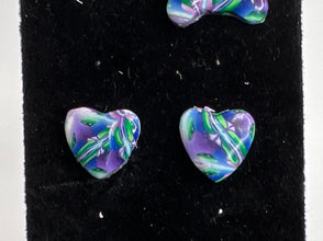Stained glass looking or kaleidoscope style stud earrings made of clay