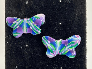 Stained glass looking or kaleidoscope style stud earrings made of clay
