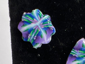 Stained glass looking or kaleidoscope style stud earrings made of clay