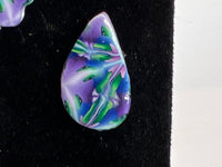 Stained glass looking or kaleidoscope style stud earrings made of clay