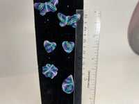 Stained glass looking or kaleidoscope style stud earrings made of clay