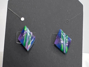 Stained glass looking or kaleidoscope style stud earrings made of clay