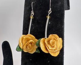 Long stem polymer clay rose earrings. Handmade per petal to give unique flower quality