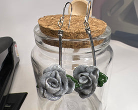 Long stem polymer clay rose earrings. Handmade per petal to give unique flower quality