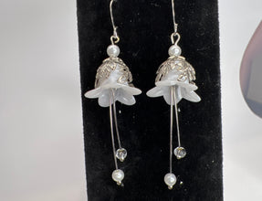 Hand painted lucite flower earring sets in varied colors