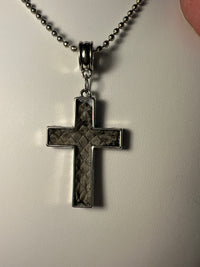 Silver plated crosses with embossed leather inside on various chains. Necklaces of faith.