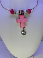 Pink cross necklace on gold plated wire with added bling