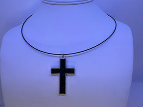 Silver plated crosses with embossed leather inside on various chains. Necklaces of faith.